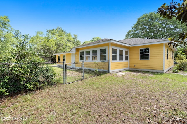 383 Red Fox St NW, Shallotte, NC 28470 - rear view of property with a gate