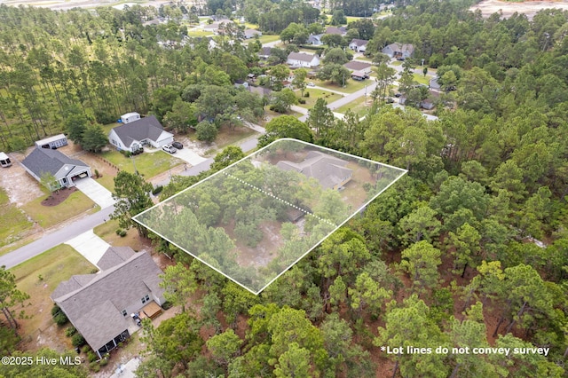 383 Red Fox St NW, Shallotte, NC 28470 - aerial overview of property's location with property parcel outlined and nearby suburban area