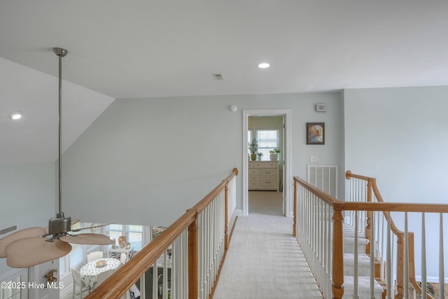 107 Sea Turtle Cv, Sneads Ferry, NC 28460 - hall featuring recessed lighting, an upstairs landing, vaulted ceiling, and light colored carpet