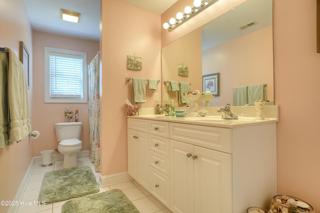 107 Sea Turtle Cv, Sneads Ferry, NC 28460 - bathroom featuring double vanity and tile patterned flooring