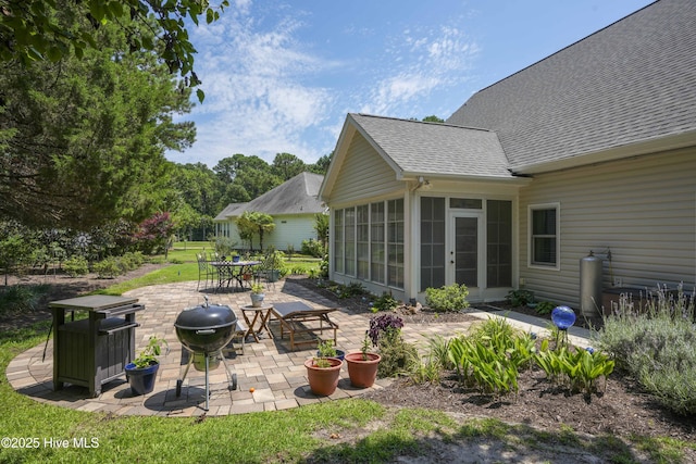 107 Sea Turtle Cv, Sneads Ferry, NC 28460 - view of yard featuring a sunroom, a patio area, and outdoor dining space