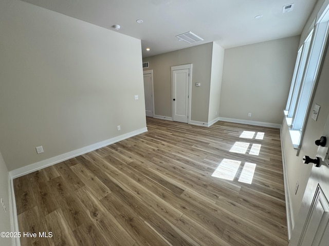 317 Whitfield Dr, Goldsboro, NC 27530 - empty room with light wood finished floors, healthy amount of natural light, and recessed lighting
