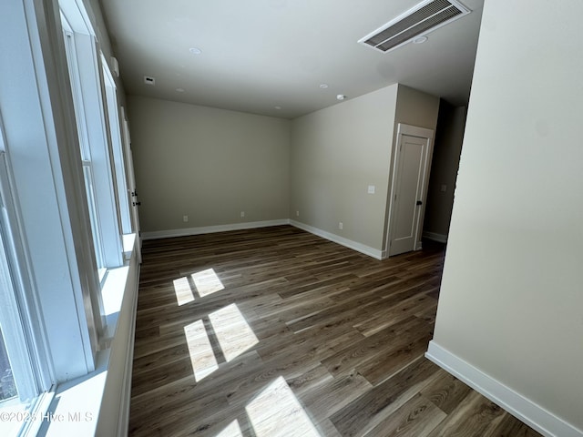 317 Whitfield Dr, Goldsboro, NC 27530 - empty room with wood finished floors and baseboards