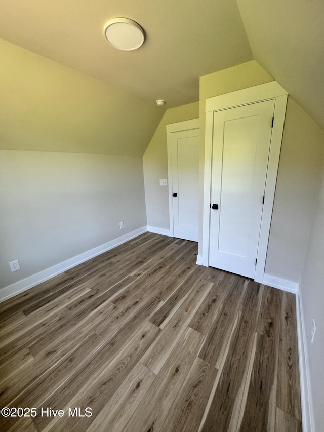 317 Whitfield Dr, Goldsboro, NC 27530 - additional living space featuring lofted ceiling and wood finished floors