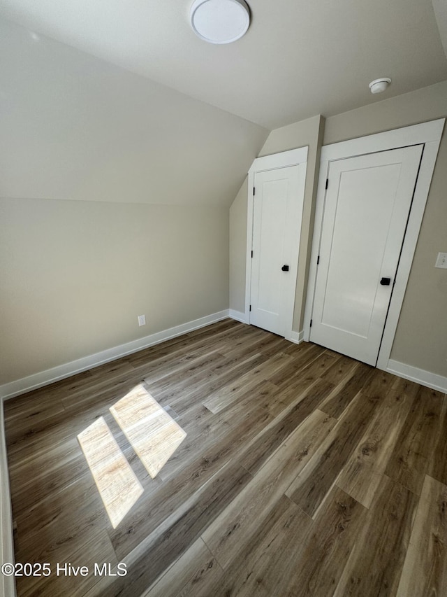 317 Whitfield Dr, Goldsboro, NC 27530 - additional living space featuring vaulted ceiling and wood finished floors