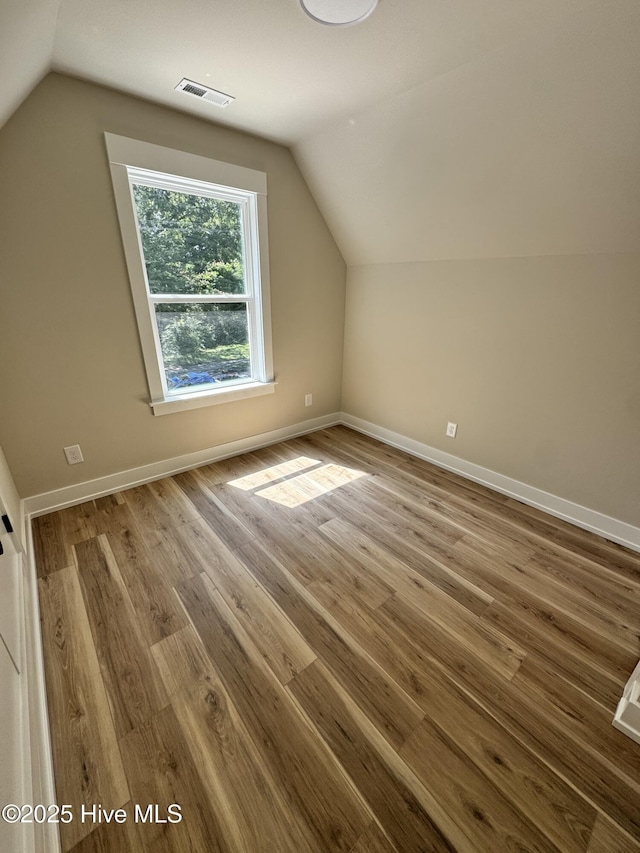 317 Whitfield Dr, Goldsboro, NC 27530 - bonus room with lofted ceiling and wood finished floors