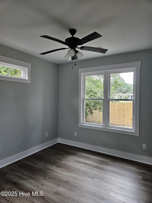 7151 Dale Ave SW, Ocean Isle Beach, NC 28469 - unfurnished room featuring ceiling fan and dark wood-style floors