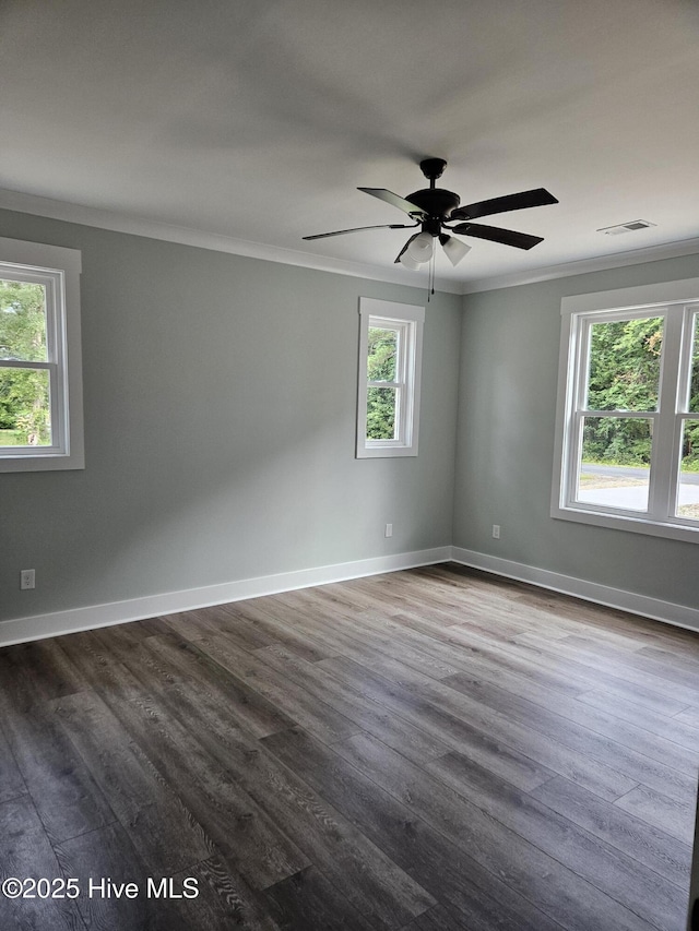 7151 Dale Ave SW, Ocean Isle Beach, NC 28469 - spare room featuring crown molding, wood finished floors, and ceiling fan