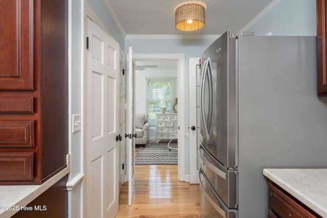 429 Tanbridge Rd, Wilmington, NC 28405 - corridor with light wood finished floors and ornamental molding