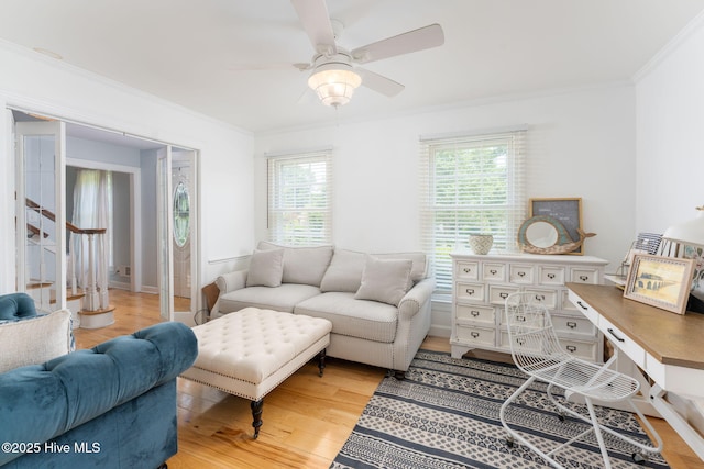 429 Tanbridge Rd, Wilmington, NC 28405 - living area with crown molding, light wood-style flooring, and ceiling fan