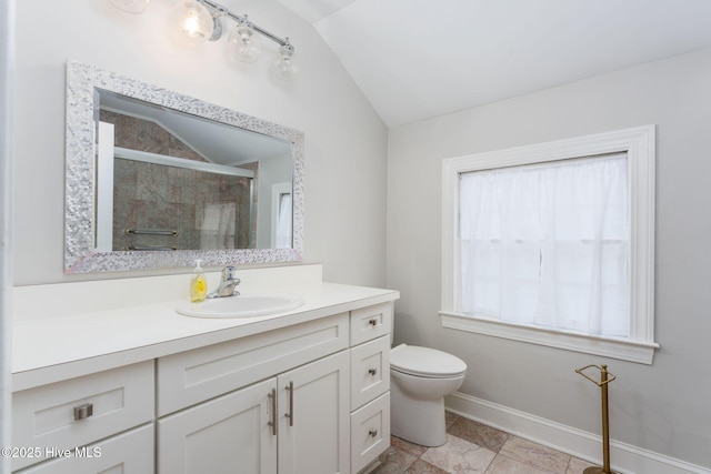 429 Tanbridge Rd, Wilmington, NC 28405 - bathroom with lofted ceiling, vanity, a shower with door, and marble look tiles