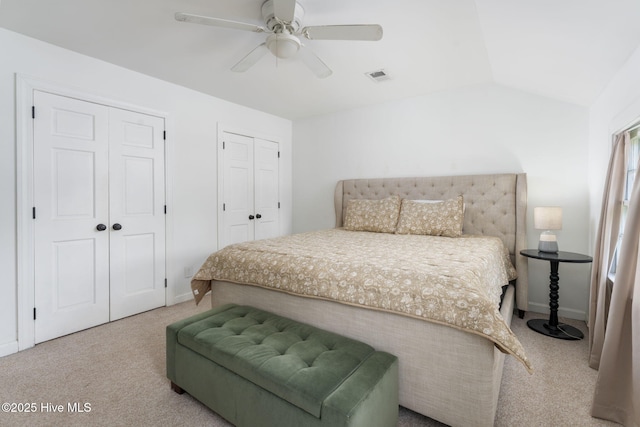 429 Tanbridge Rd, Wilmington, NC 28405 - bedroom featuring carpet, two closets, lofted ceiling, and a ceiling fan
