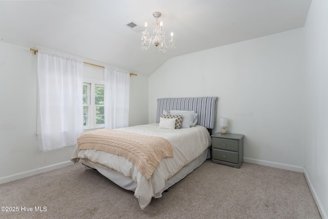 429 Tanbridge Rd, Wilmington, NC 28405 - carpeted bedroom featuring a chandelier and vaulted ceiling