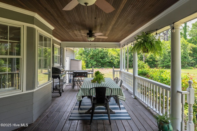 429 Tanbridge Rd, Wilmington, NC 28405 - wooden porch featuring outdoor dining area, ceiling fan, and area for grilling