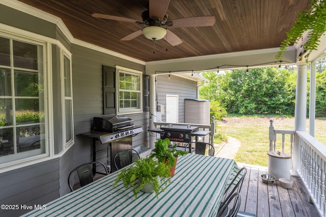 429 Tanbridge Rd, Wilmington, NC 28405 - deck with outdoor dining area, a ceiling fan, and area for grilling