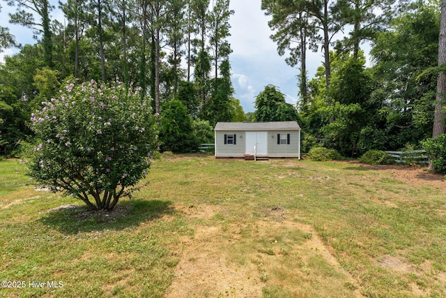 429 Tanbridge Rd, Wilmington, NC 28405 - view of grassy yard featuring an outdoor structure