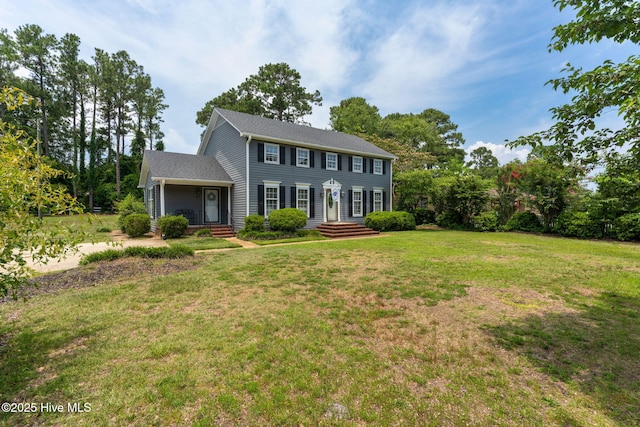 429 Tanbridge Rd, Wilmington, NC 28405 - colonial house featuring a front yard
