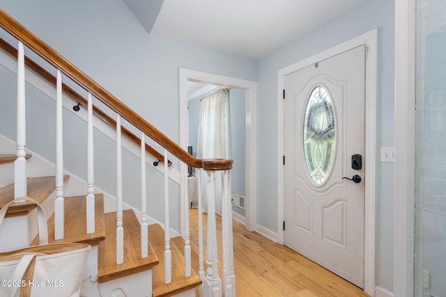 429 Tanbridge Rd, Wilmington, NC 28405 - entrance foyer featuring light wood-style flooring and stairs