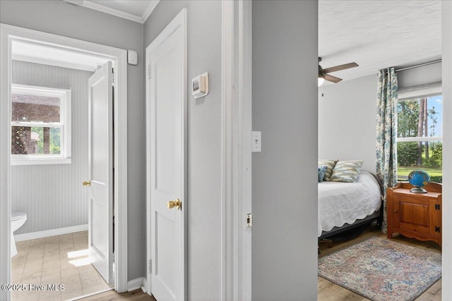 bedroom featuring baseboards and ornamental molding