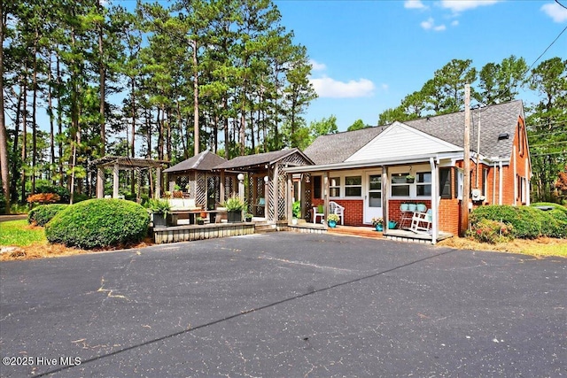 view of building exterior with driveway