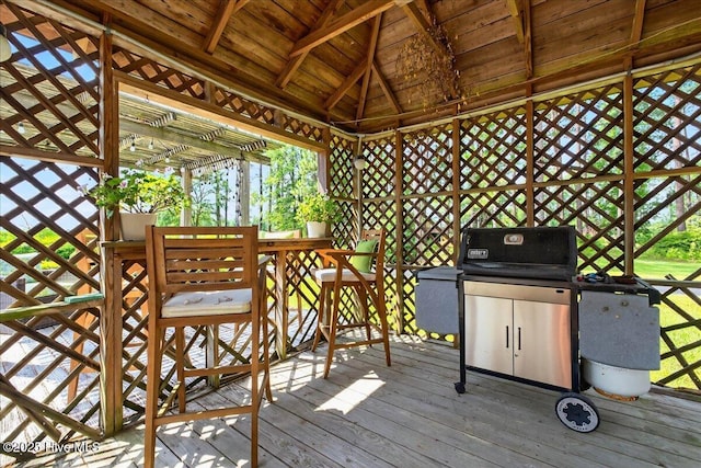 wooden terrace with a gazebo