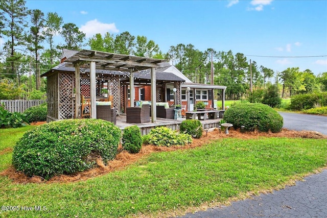 view of front of house with an outdoor hangout area and a pergola