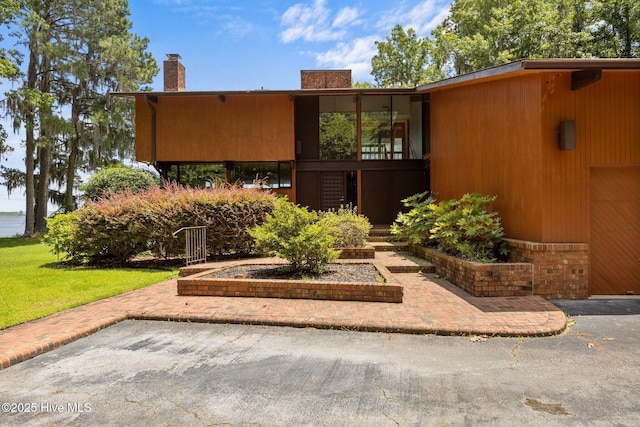 1402 Green Springs Rd, New Bern, NC 28560 - view of front of property with a chimney