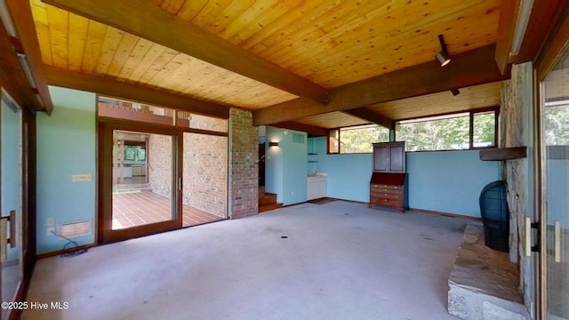 1402 Green Springs Rd, New Bern, NC 28560 - carpeted spare room with baseboards and a wood ceiling with exposed beams