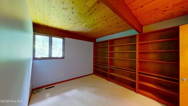 1402 Green Springs Rd, New Bern, NC 28560 - unfurnished room featuring carpet flooring, a wooden ceiling with exposed beams, and built in shelves