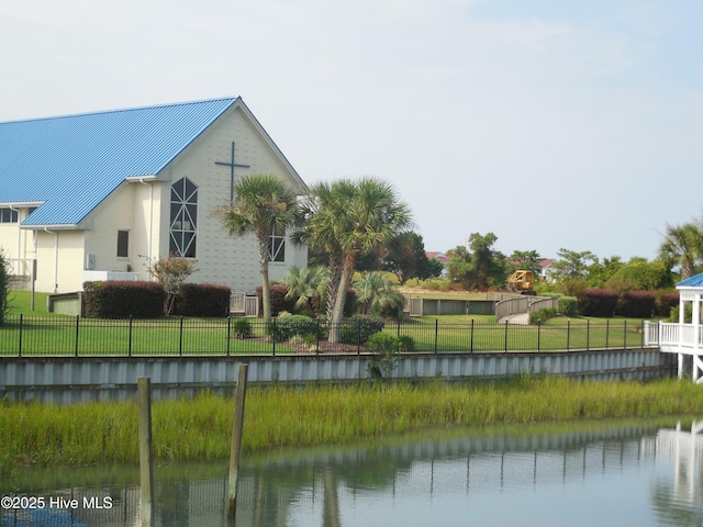 7 Oleander Ln, Ocean Isle Beach, NC 28469 - view of side of home featuring a water view