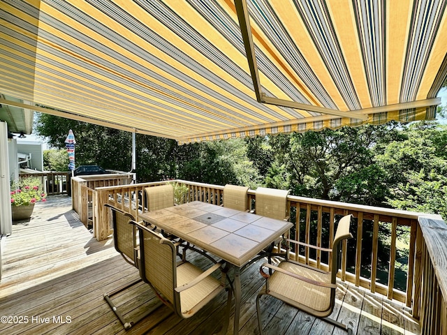 122 Ethel Dr, Emerald Isle, NC 28594 - wooden deck with outdoor dining area
