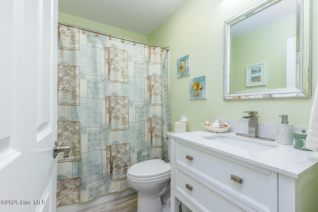 7161 Windward Dr, New Bern, NC 28560 - full bathroom featuring vanity and wood finished floors