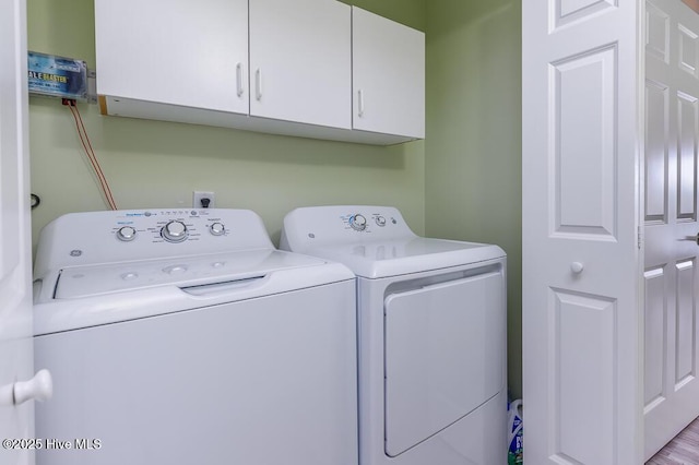 7161 Windward Dr, New Bern, NC 28560 - laundry room featuring cabinet space and independent washer and dryer