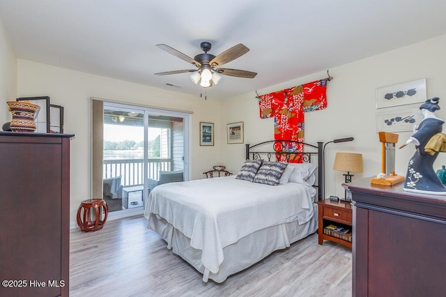 7161 Windward Dr, New Bern, NC 28560 - bedroom featuring access to exterior, light wood-style floors, and ceiling fan