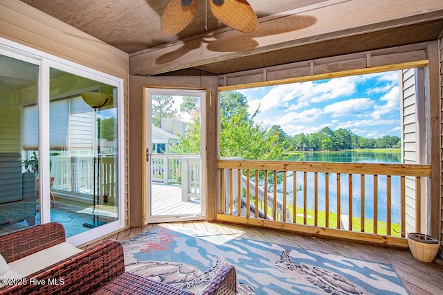 7161 Windward Dr, New Bern, NC 28560 - sunroom / solarium featuring hardwood / wood-style flooring, wooden walls, wood ceiling, and a deck with water view