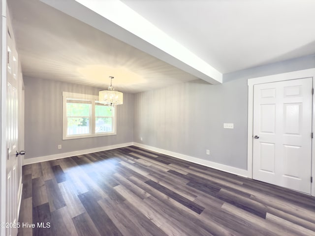 9891 Red Fox, Winnabow, NC 28479 - empty room with a chandelier and dark wood-style flooring