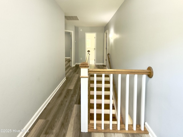 9891 Red Fox, Winnabow, NC 28479 - hall with an upstairs landing and dark wood-style floors