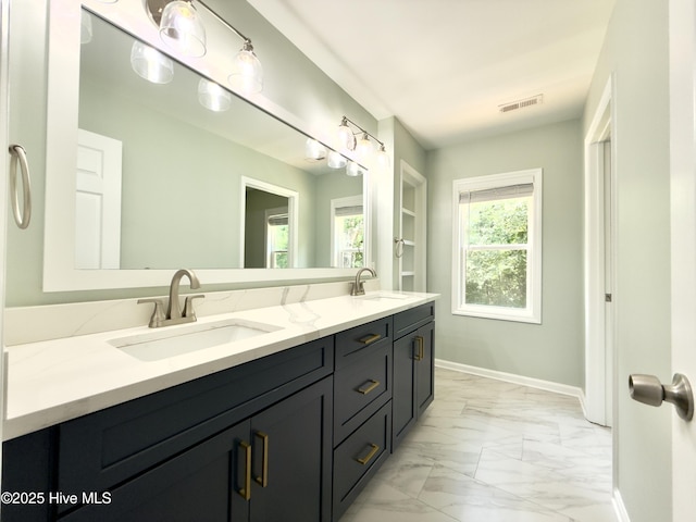 9891 Red Fox, Winnabow, NC 28479 - full bathroom with marble look tile flooring and double vanity