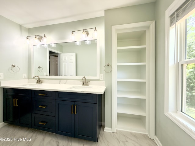 9891 Red Fox, Winnabow, NC 28479 - full bath with double vanity, marble finish flooring, healthy amount of natural light, and a closet