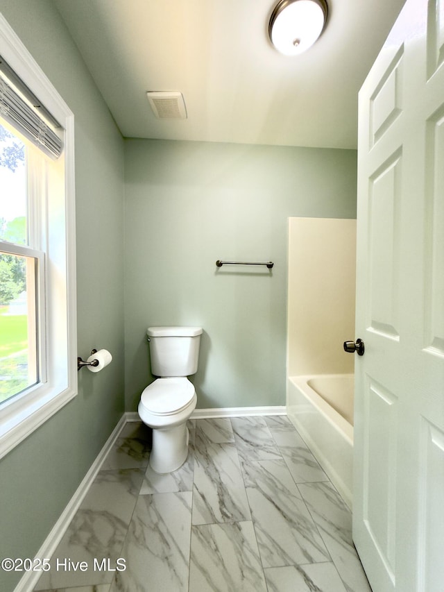 9891 Red Fox, Winnabow, NC 28479 - bathroom with marble finish flooring, plenty of natural light, and a tub