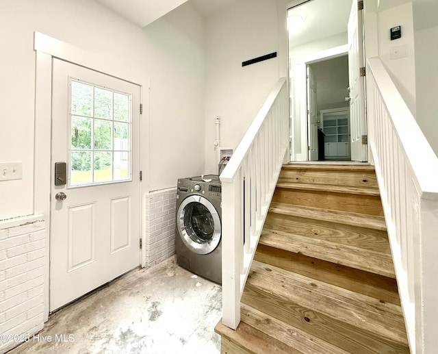 9891 Red Fox, Winnabow, NC 28479 - laundry area featuring washer / clothes dryer and wainscoting
