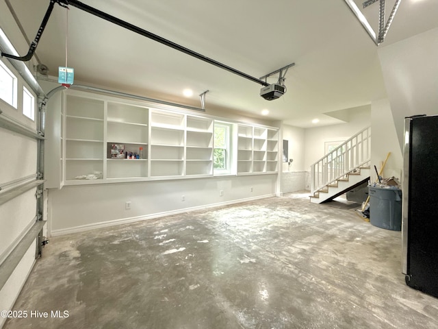 9891 Red Fox, Winnabow, NC 28479 - garage featuring a garage door opener and recessed lighting