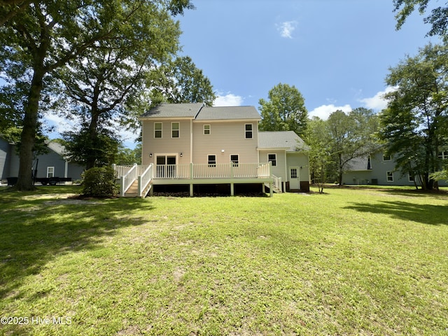 9891 Red Fox, Winnabow, NC 28479 - rear view of property with a yard, a wooden deck, and stairs