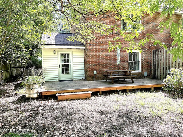 735 N Bennett St Unit A, Southern Pines, NC 28387 - rear view of house featuring a deck and brick siding