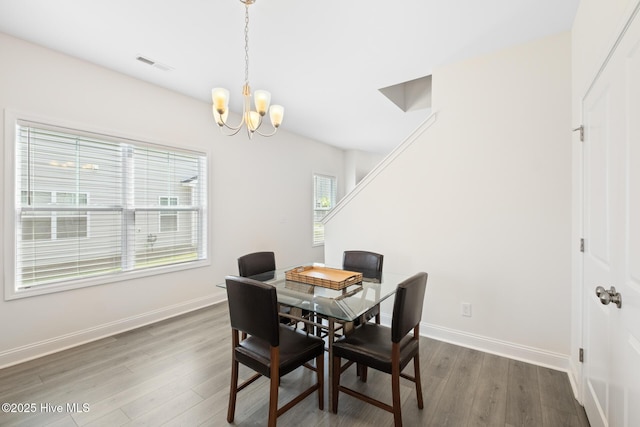 1620 Bratton Ct, Wilmington, NC 28405 - dining space featuring a chandelier and wood finished floors