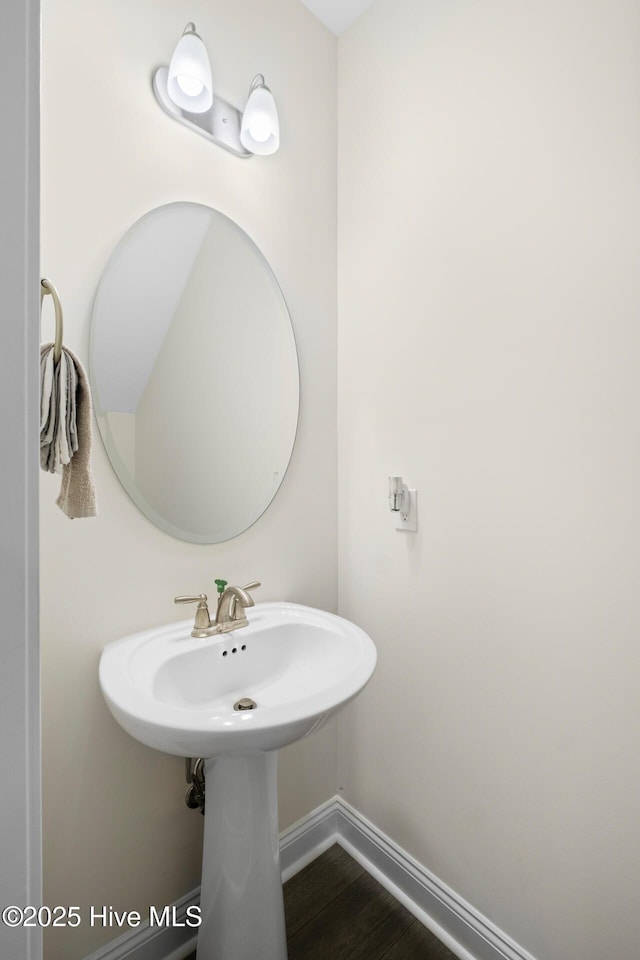 1620 Bratton Ct, Wilmington, NC 28405 - bathroom featuring baseboards and wood finished floors