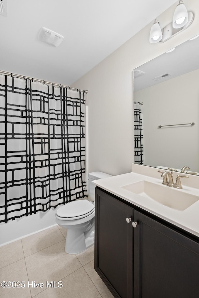 1620 Bratton Ct, Wilmington, NC 28405 - bathroom featuring vanity, tile patterned floors, and shower / tub combo with curtain
