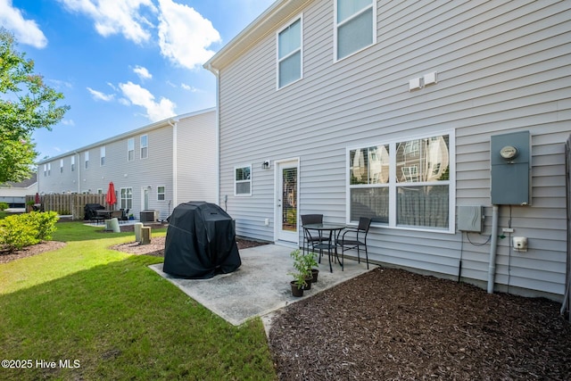 1620 Bratton Ct, Wilmington, NC 28405 - back of property with a patio area and a yard