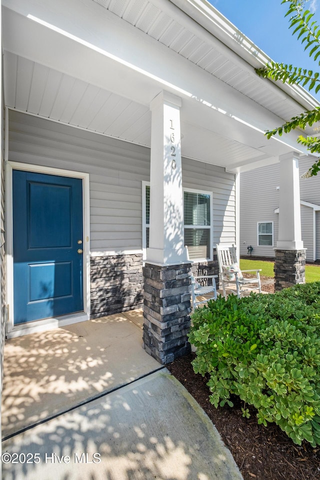 1620 Bratton Ct, Wilmington, NC 28405 - entrance to property featuring covered porch and stone siding