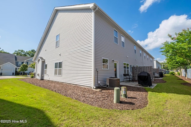 1620 Bratton Ct, Wilmington, NC 28405 - view of side of home featuring a cooling unit and a patio